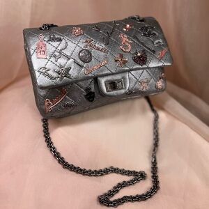 CHANEL LUCKY CHARMS PURSE circa 2006-2008.   Silver.